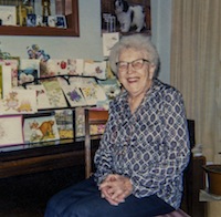 Anna enjoying birthday cards, Pontiac, Michigan, 1980