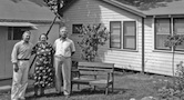 Bud, Millie, Albert Sr at Burroughs Farms, Michigan, about 1938; note canvas roof and wooden sides the Frye's 'camped' in during the summer